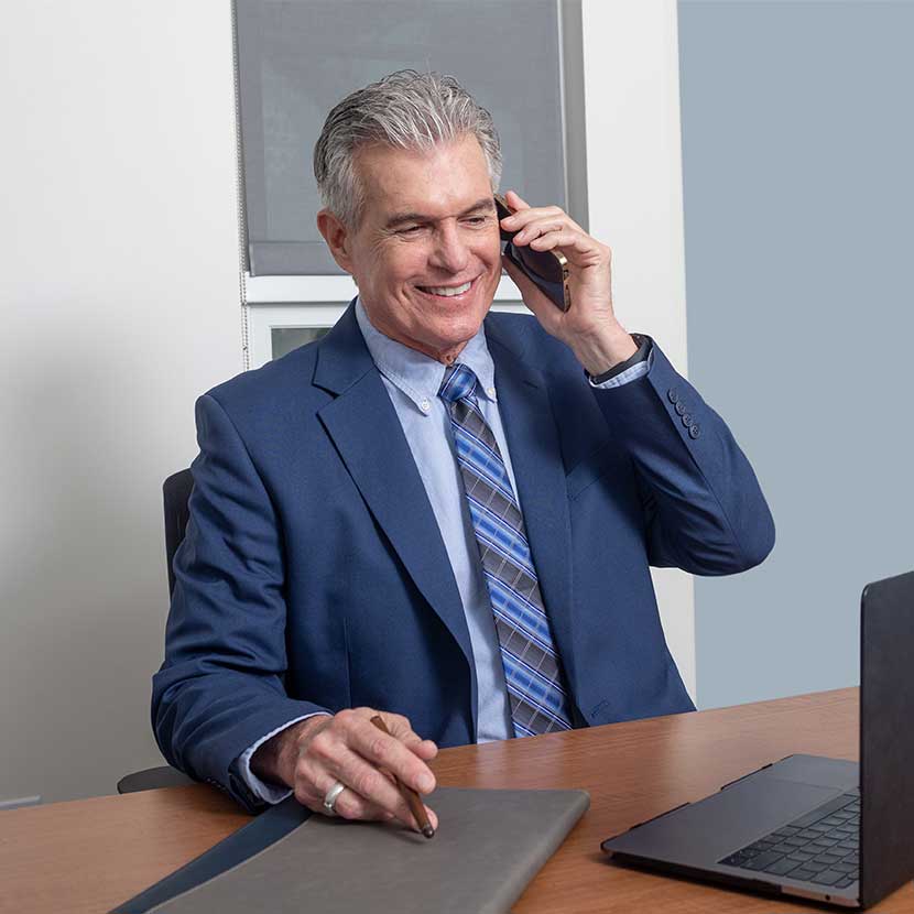 A financial professional in office learning about the TruStage™ Acceleration® program to help fuel his professional success.