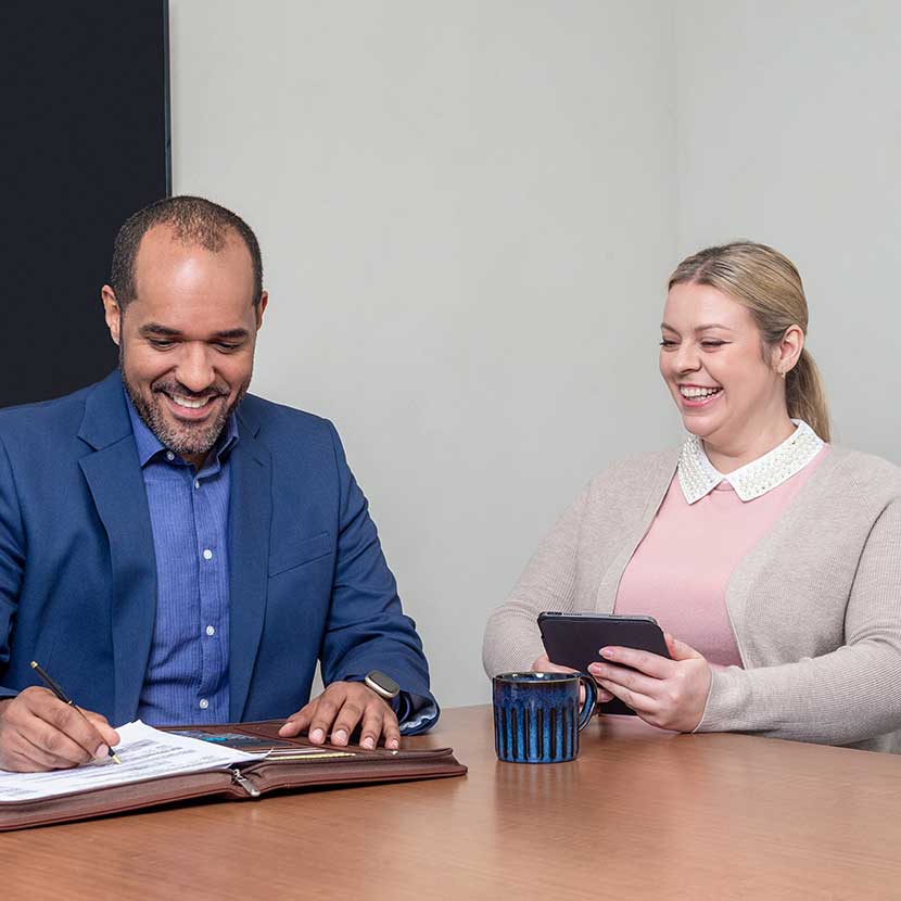 Man and woman talking about TruStage Annuities
