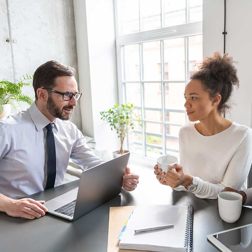 Man and woman talking about TruStage Annuities