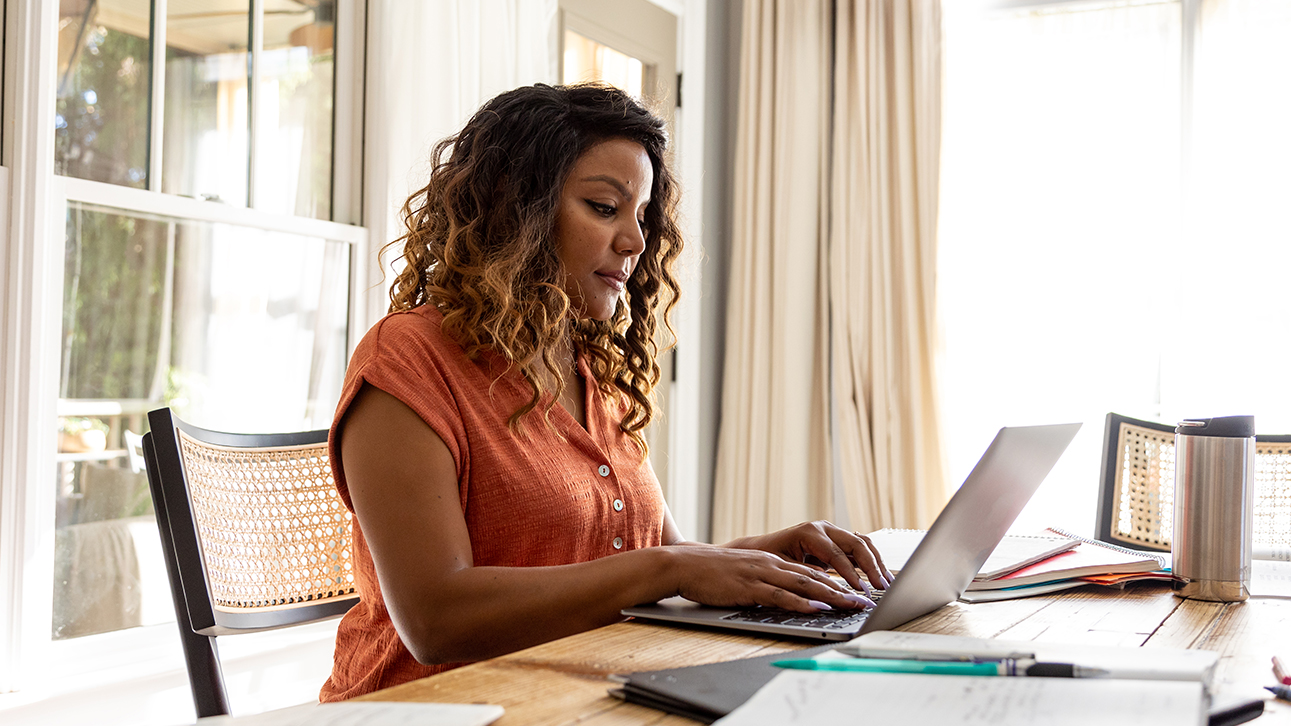 Woman looking up information about TruStage Discovery2024 on demand