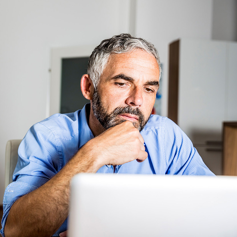 Man looking at laptop