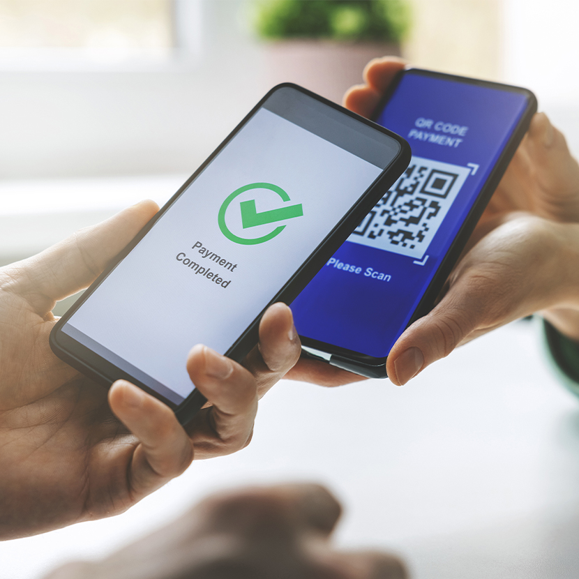 A smartphone scanning a QR code on another smartphone